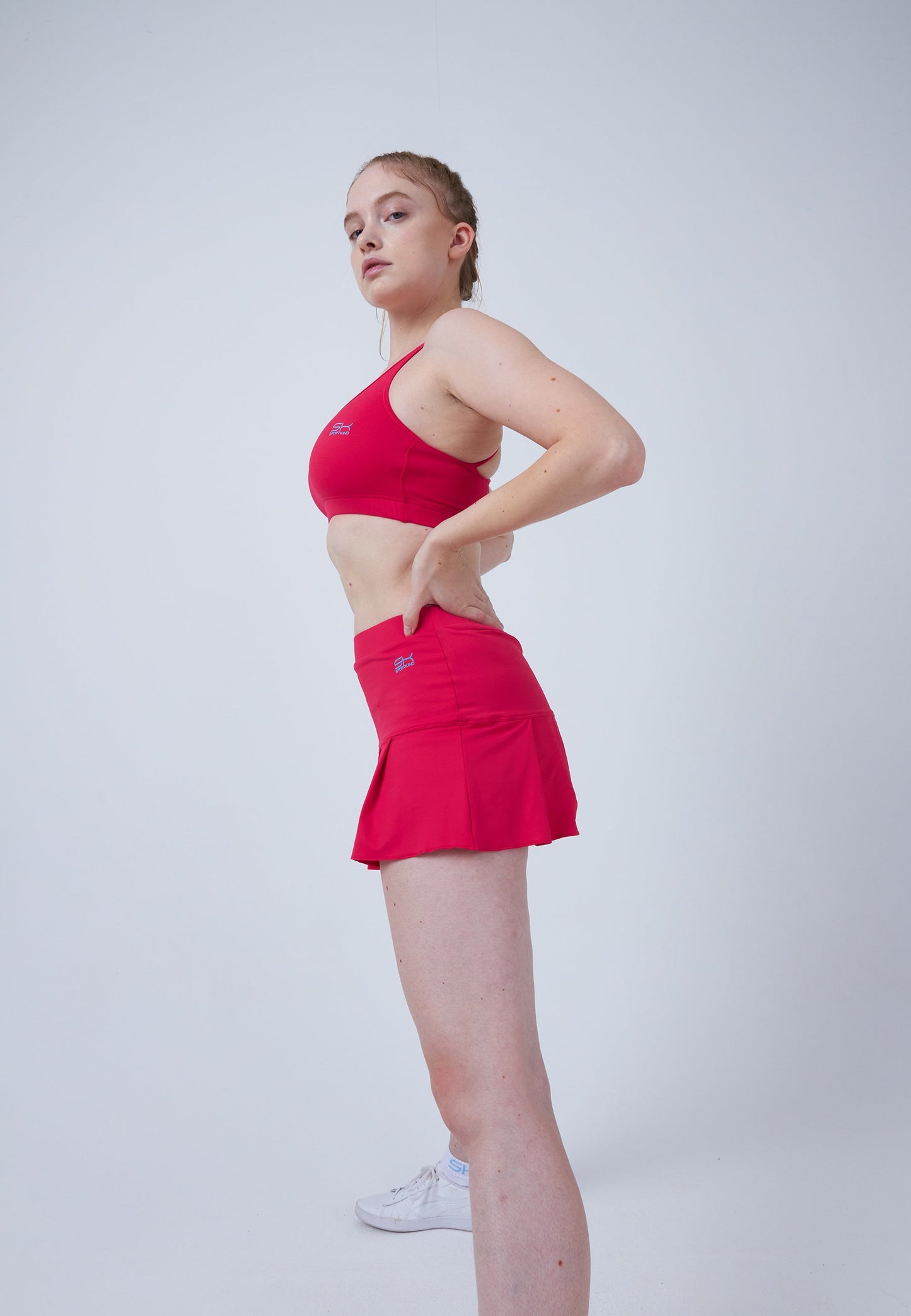 Tennisrock mit Falten / Skort, pink