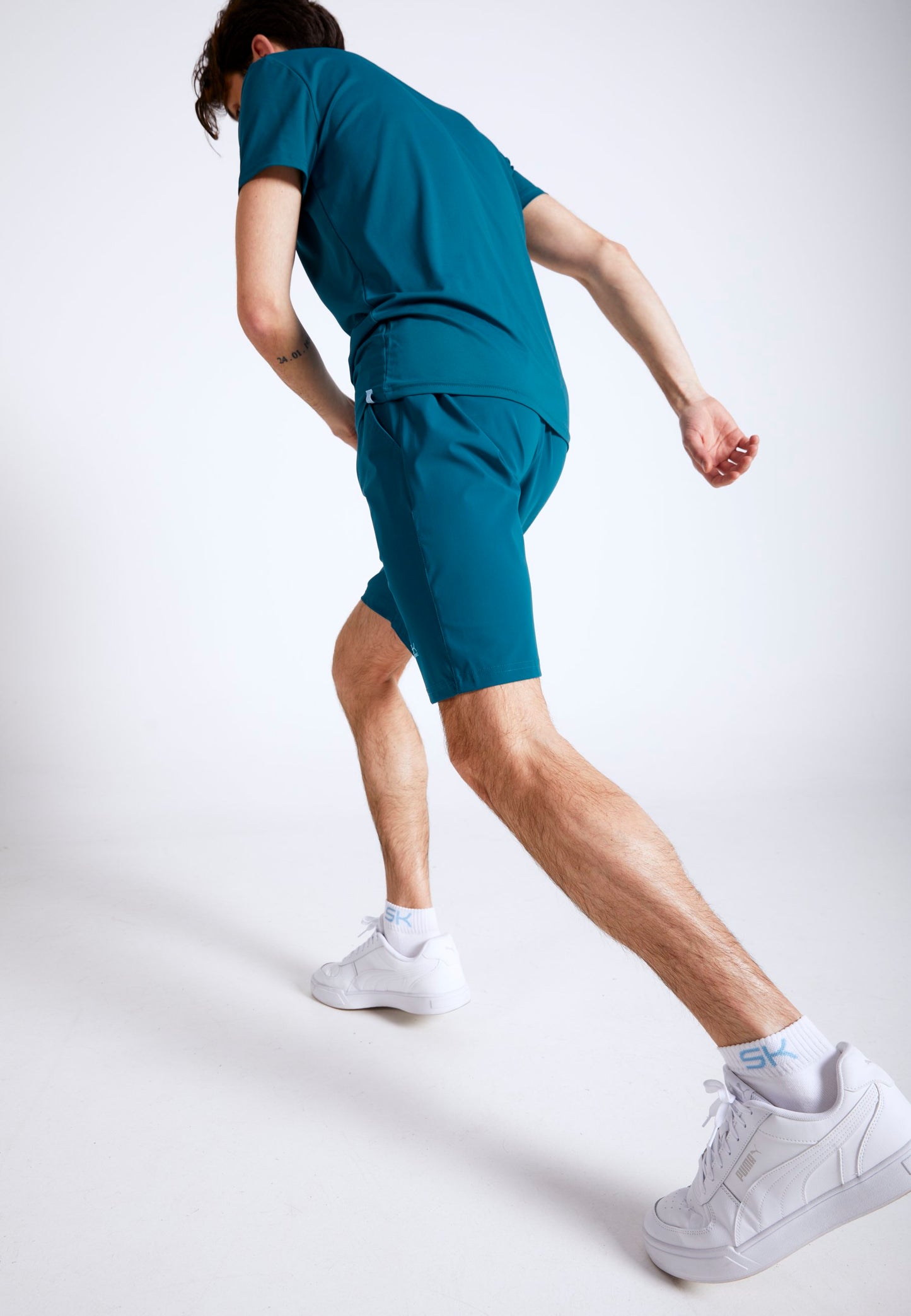 Tennis Shorts lang, petrol grün