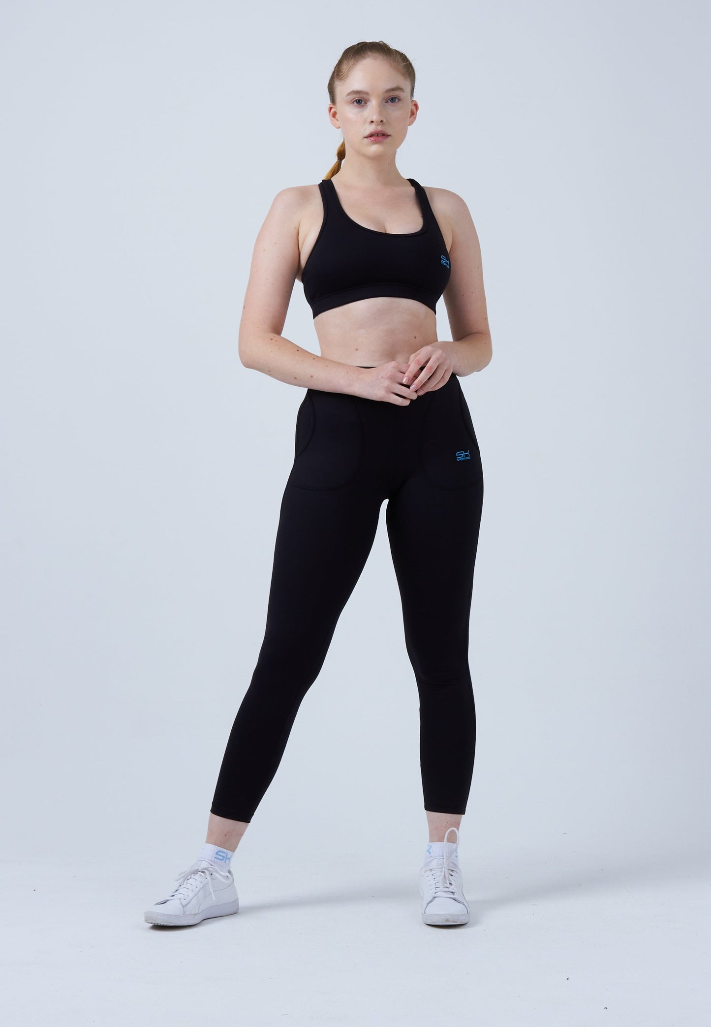 Tennis Leggings mit Taschen lang, schwarz