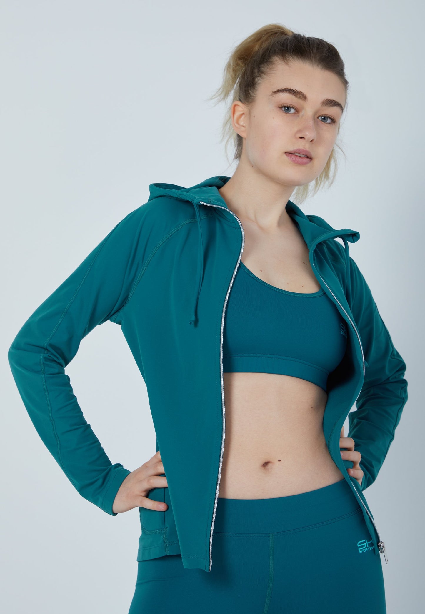 Tennis Joggingjacke mit Kapuze, petrol grün