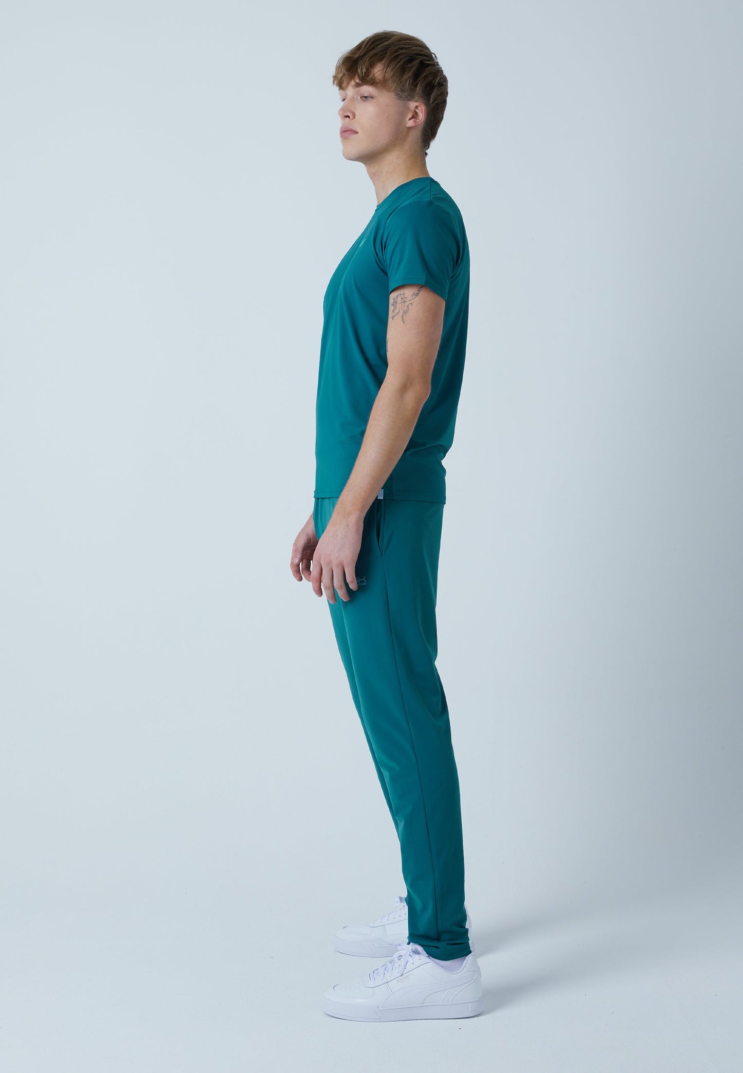 Tennis Trainingshose schmal, petrol grün