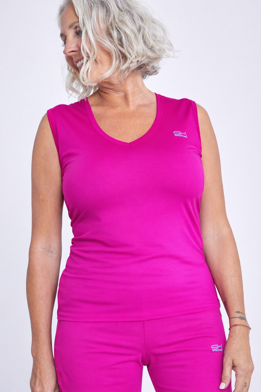 Mädchen & Damen Tennis Loose Fit Tanktop V-Neck, berry pink von SPORTKIND