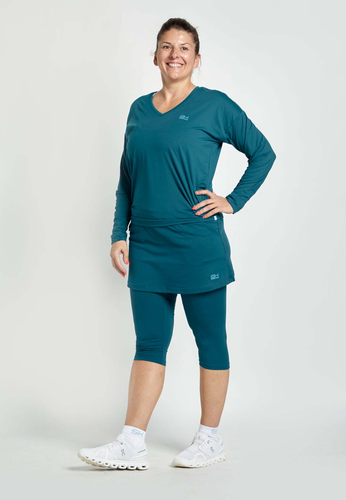 Mädchen & Damen Tennis Loose Fit Langarmshirt V-Neck, petrol gruen von SPORTKIND