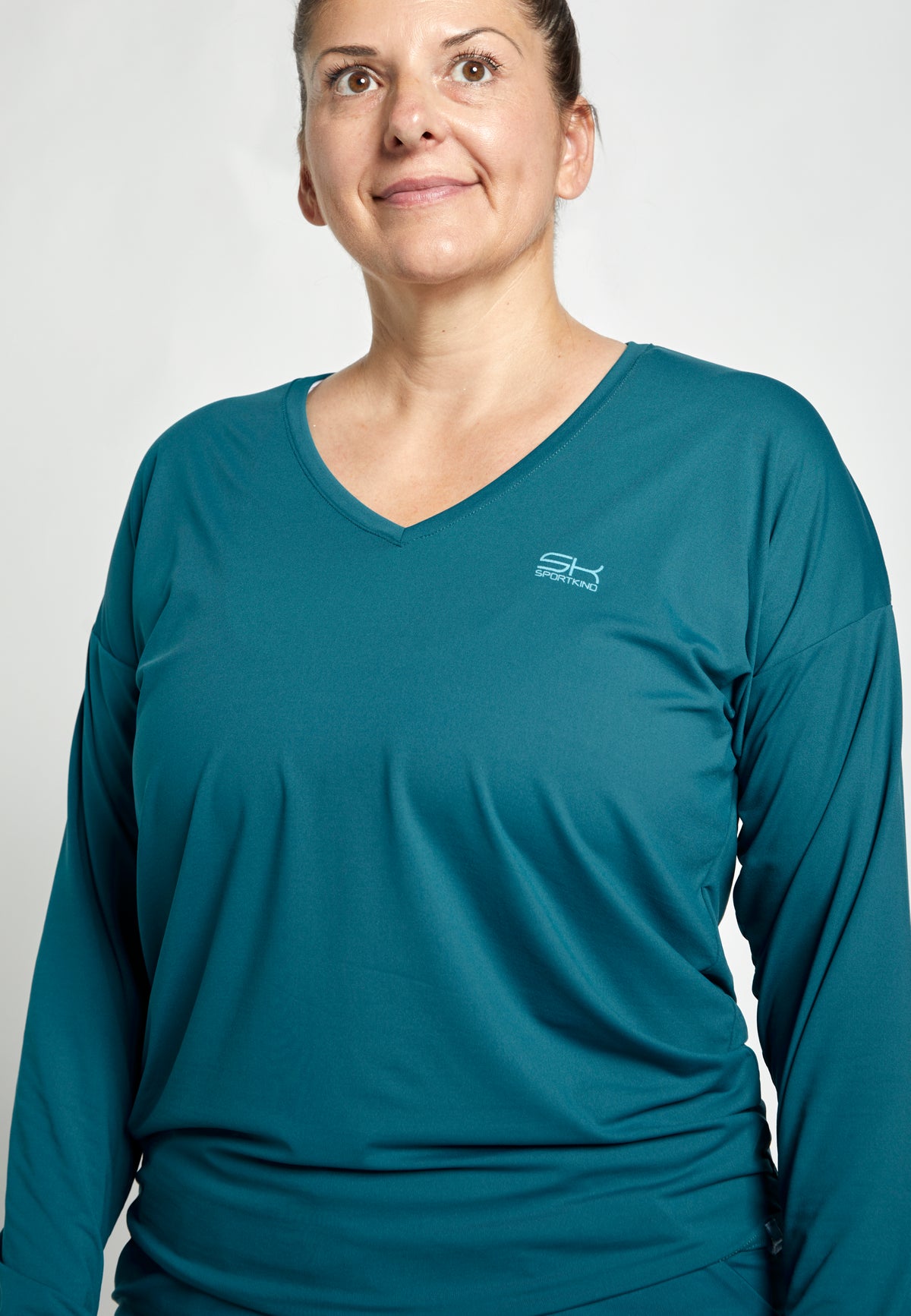 Mädchen & Damen Tennis Loose Fit Langarmshirt V-Neck, petrol gruen von SPORTKIND