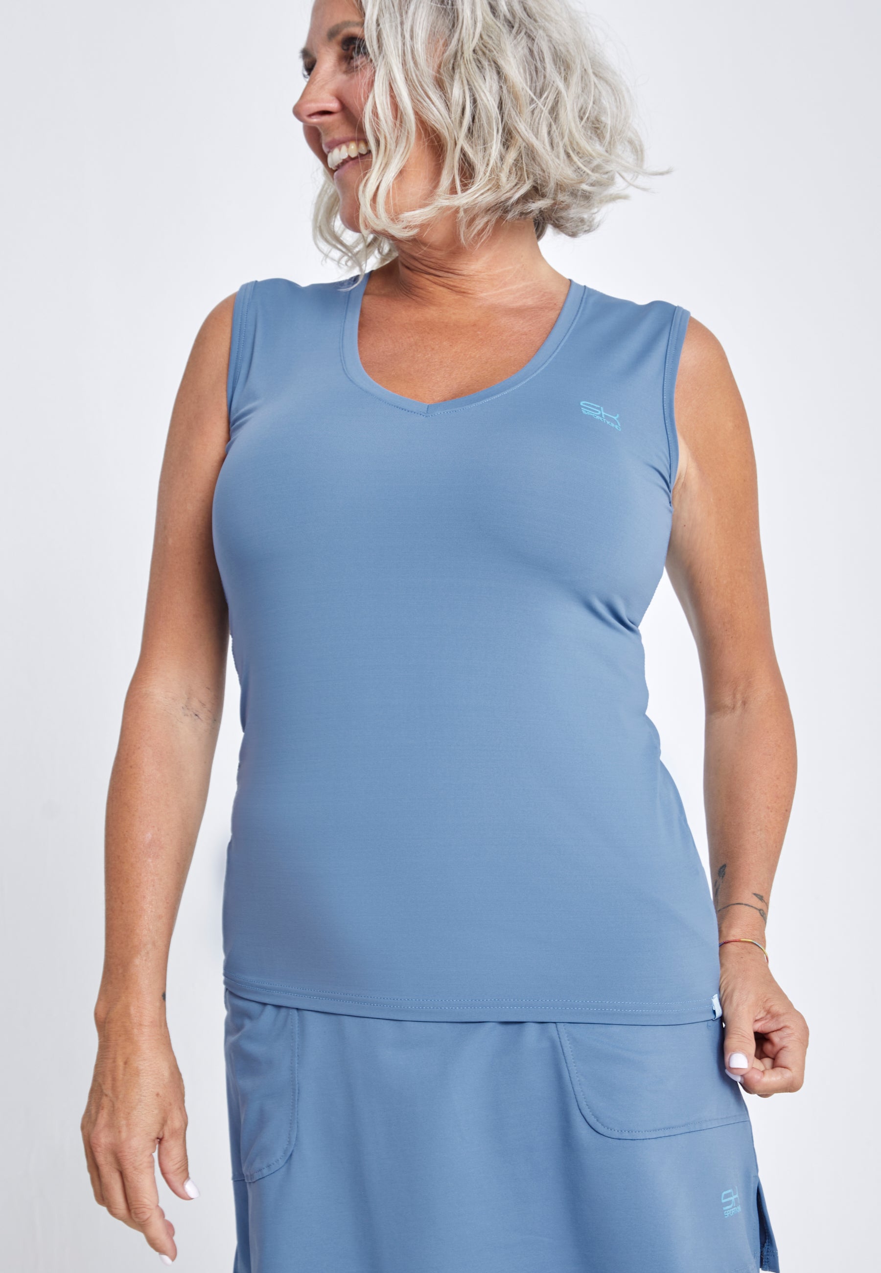 Mädchen & Damen Tennis Loose Fit Tanktop V-Neck, grau blau von SPORTKIND