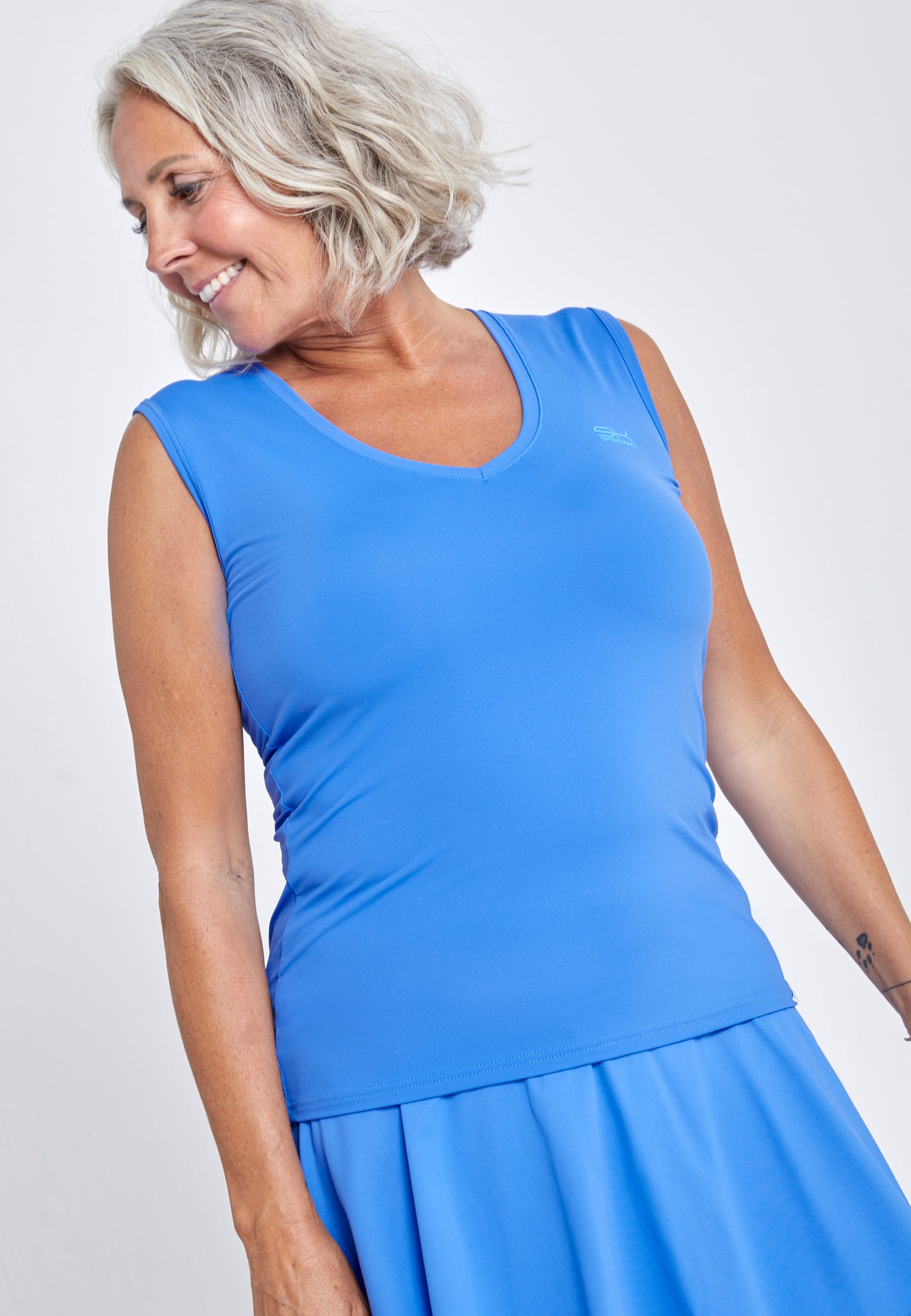 Mädchen & Damen Tennis Loose Fit Tanktop V-Neck, kornblumen blau von SPORTKIND