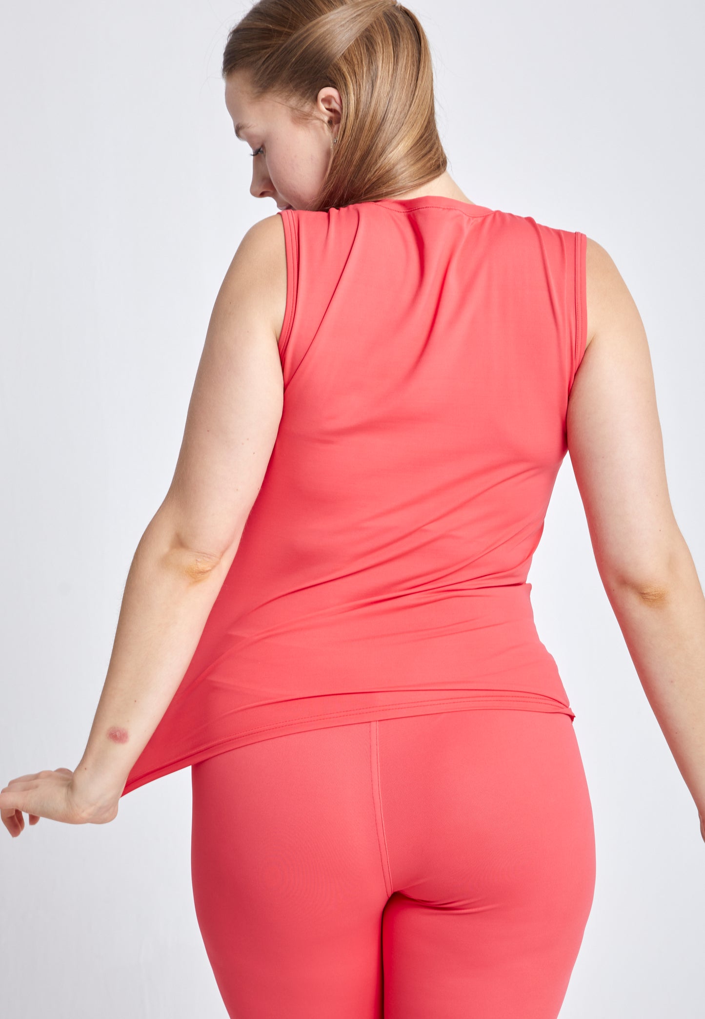 Mädchen & Damen Tennis Loose Fit Tanktop V-Neck, pfirsich von SPORTKIND