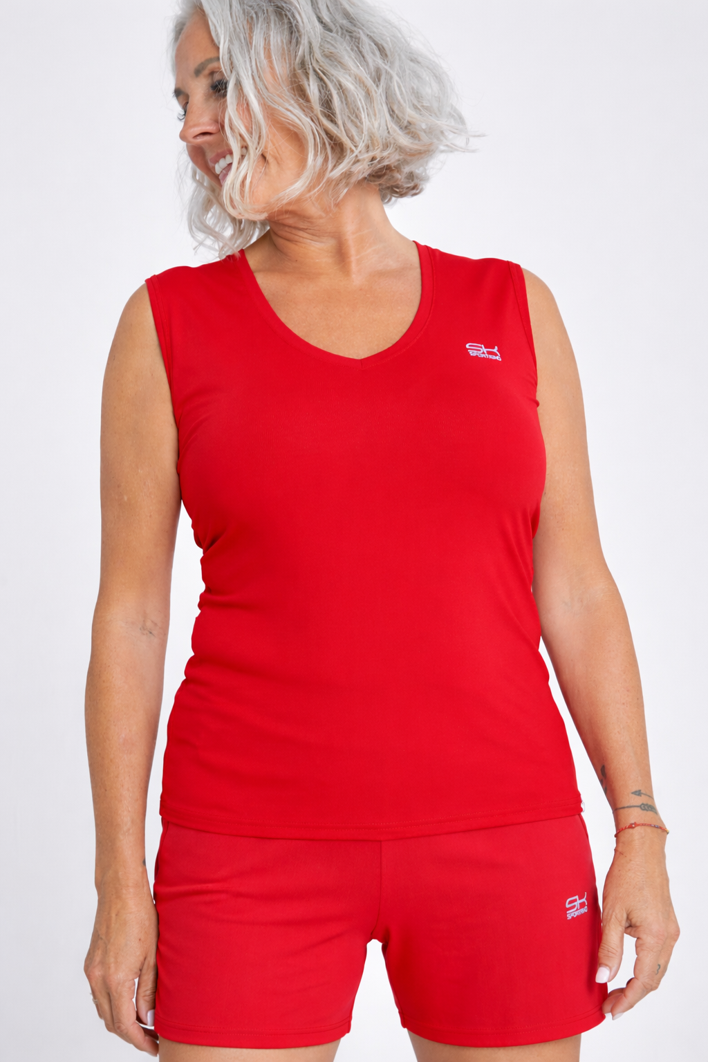 Mädchen & Damen Tennis Loose Fit Tanktop V-Neck, rot von SPORTKIND