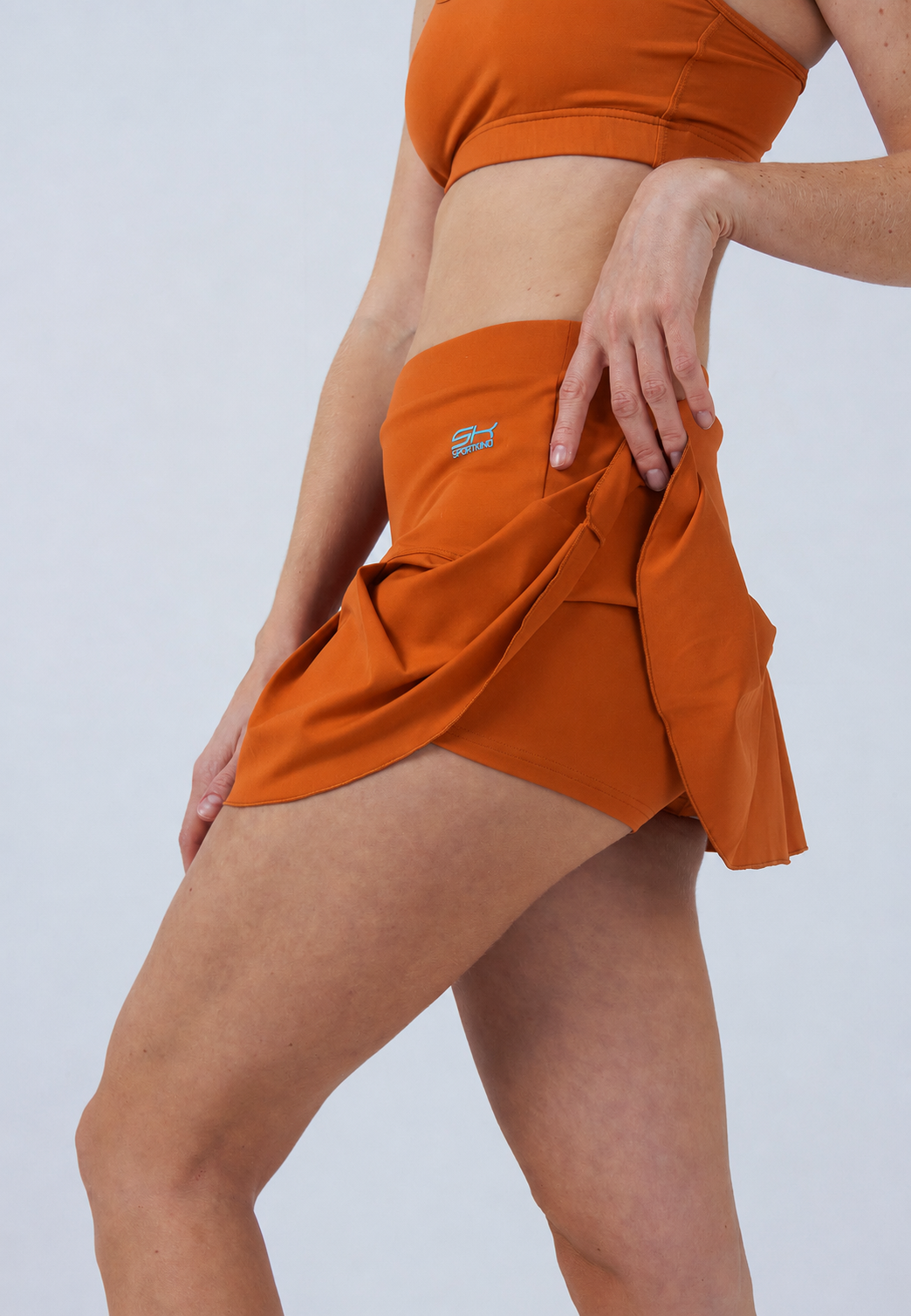 Mädchen & Damen Tennisrock mit Falten / Skort, cognac von SPORTKIND